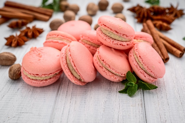 Parisian macarons on white wooden table