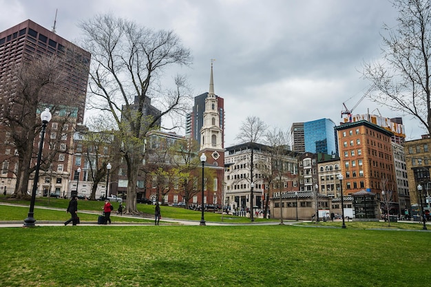 Park Street Church in Boston Common public park in downtown Boston, Massachusetts, of the United States. People on the background