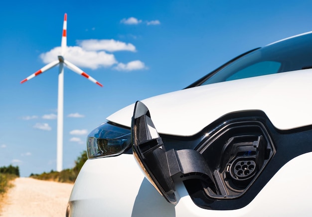 Parked electric car with windmill