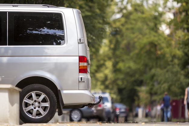 Parked silver van on street