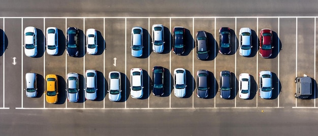 a parking lot filled with lots of parked cars