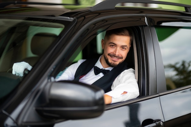 Parking valet taking care of customer vehicle