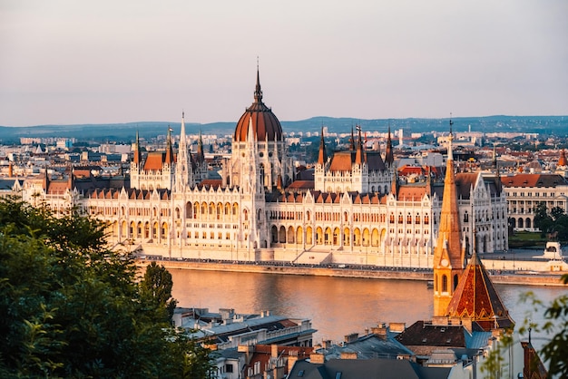 Parliament building in Budapest with fantastic perfect sky and reflection in water calm Danube river Popular Travel destinations