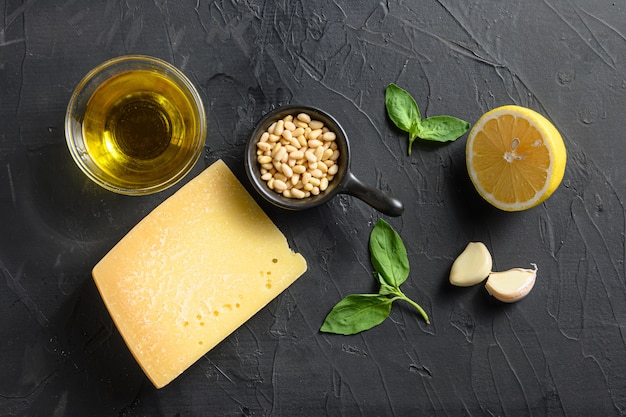 Parmesan cheese with basil leaves and pine nuts