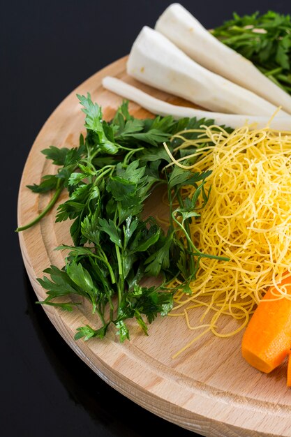  Parsley, carrots and noodles for soup