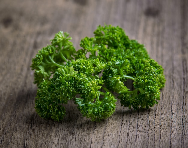 Parsley on old wooden