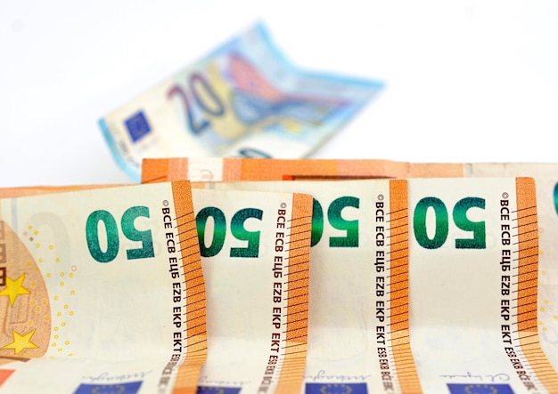 part of 50 euro banknote closeup on white background