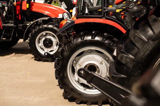 Part of agriculture machine close up with hydraulic system, steel tubes, industrial tools equipment, tractor or harvester, toned