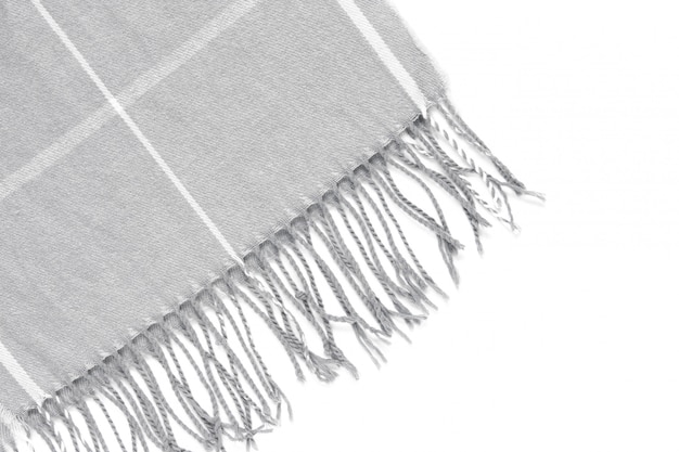 Part of a beautiful gray scarf in a cage isolated