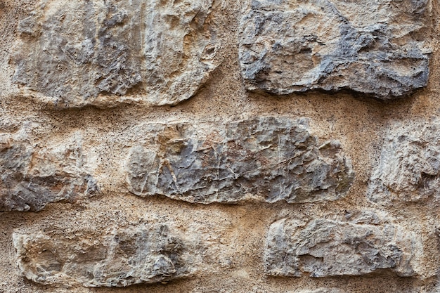 Photo part of a big stone wall for wall or texture