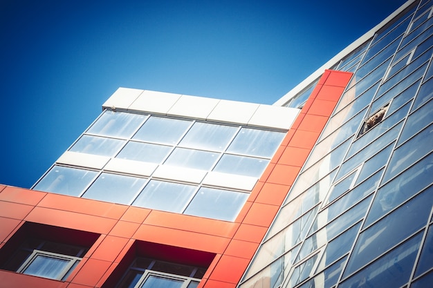 Part of the building in the style of mod hi-tech on the background of clear sky at an angle filter