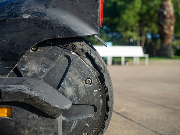 Part of an electric scooter closeup Broken tire Broken scooter wheel Propulsion tool