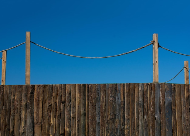 Part of a fence made of wood