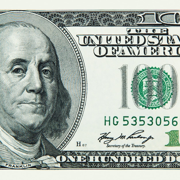 part of a hundred american dollar bill close-up.