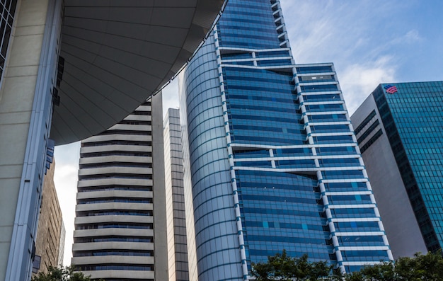 Part of modern  building and blue glass skyscapers