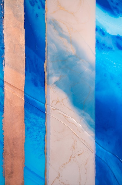 元の樹脂アート エポキシ樹脂塗装の一部 大理石のテクスチャ モダンなバナーの流体アート 空気のようなグラフィック デザイン 抽象的な空気のようなゴールド ブロンズ 青と白の渦巻き