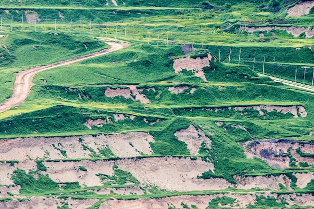 Part of a pit with big mining truck working