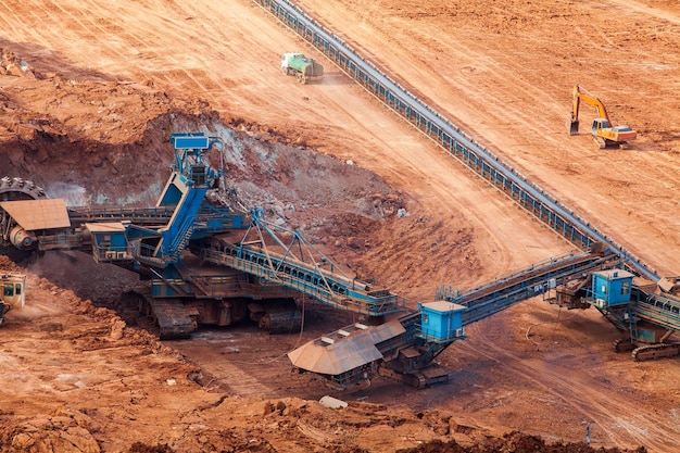 Part of a pit with big mining truck working