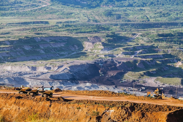 Part of a pit with big mining truck working