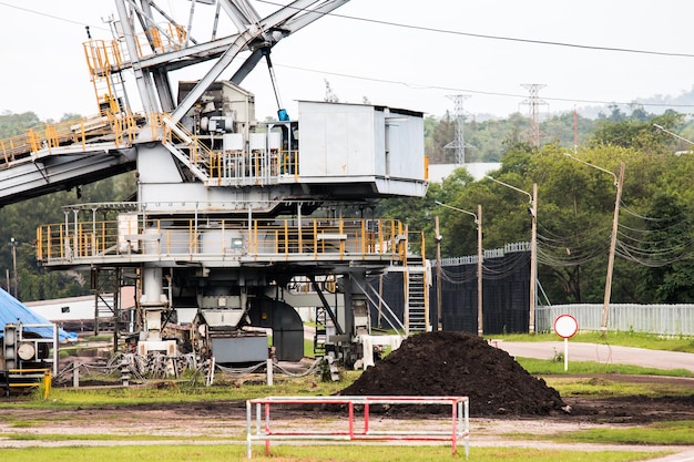 Part of a pit with big mining truck working