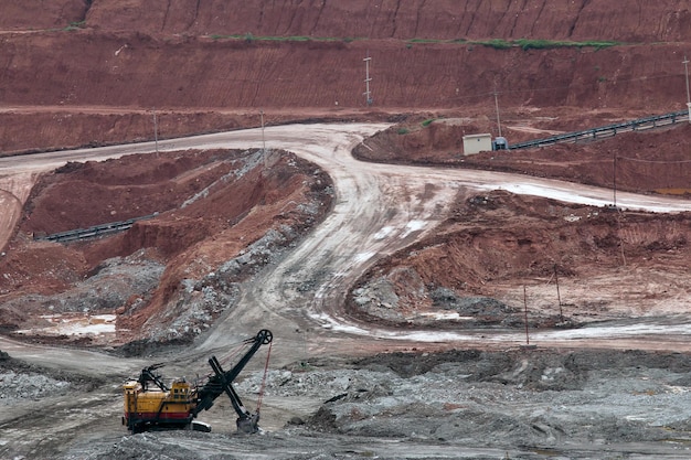 Part of a pit with big mining truck working