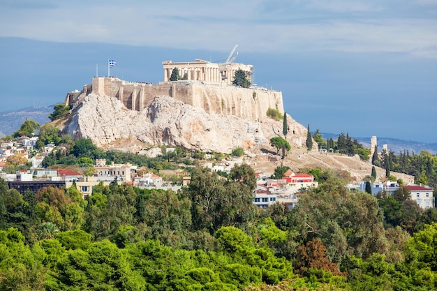 The Parthenon Temple on the Acropolis in Athens, Greece. The Acropolis of Athens is an ancient citadel located on a rocky outcrop above the city of Athens.