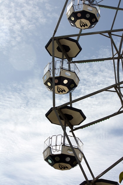 Partial view of a giant wheel on an amusement park.