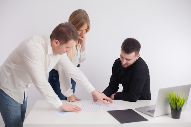 Partners discuss the project of work in the company's office