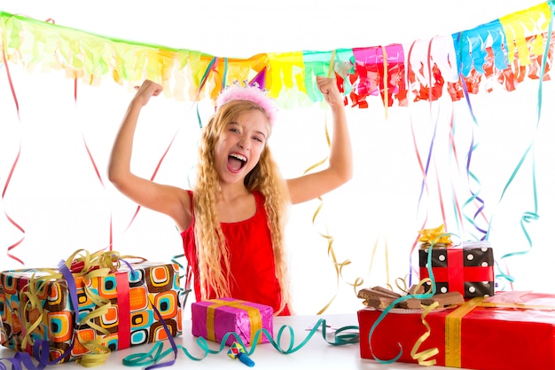 Party blond kid girl happy with many presents