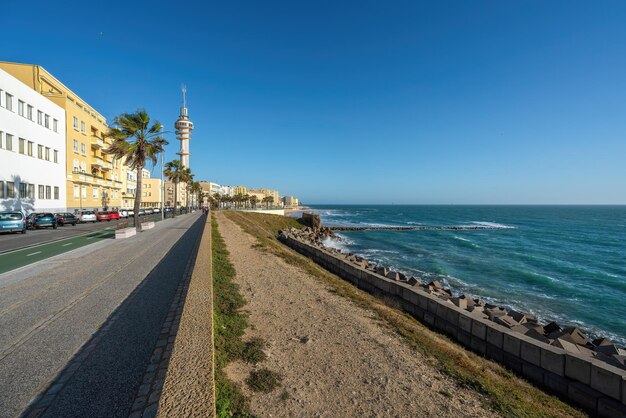 Paseo del vendaval promenade with tavira ii tower cadiz andalusia spain