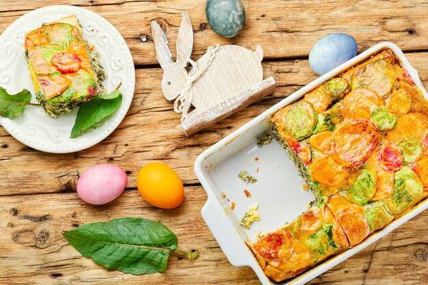 Pasqualina Italian Easter cake with green and egg.Easter pie with eggs