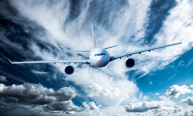 Passenger Airliner flying in the clouds