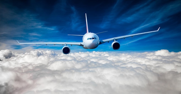 Passenger Airliner flying in the clouds