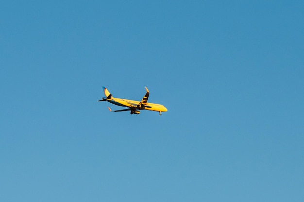 Passenger airplane flying in the blue sky