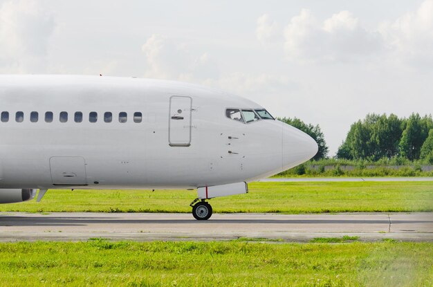 Passenger airplane portholes nose cockpit side view