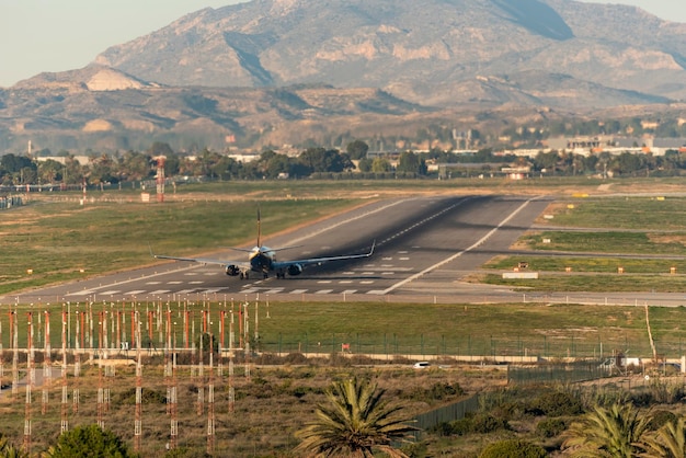 A passenger airplane ready to take off Alicante Elche airport Costa Blanca Spain