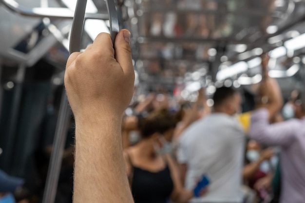 Passenger hand inside subway