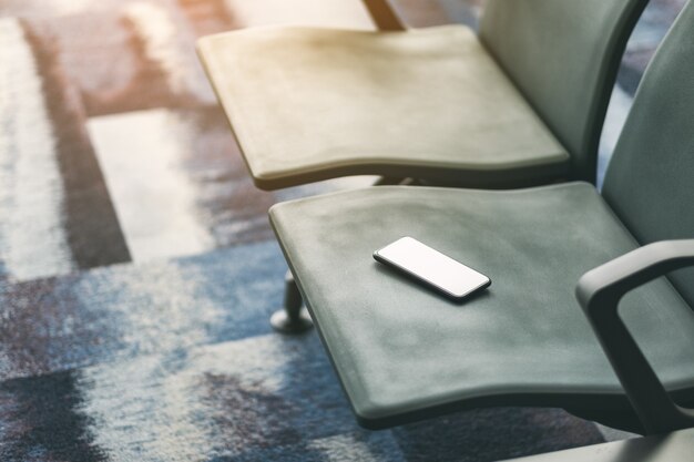 Passenger lost mobile phone on the airport chair