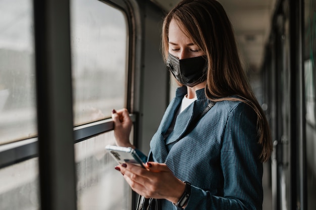 Passenger in the train wearing medical mask