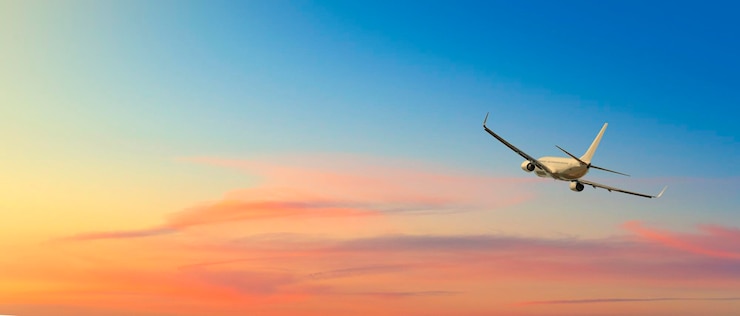 Photo passengers commercial airplane flying above clouds in sunset light concept of fast travel holidays and business