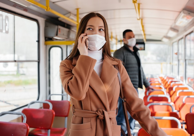 Passengers on public transport during the coronavirus pandemic keep their distance from each other. Protection and prevention covid 19.