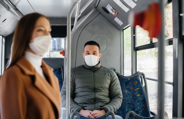 Passengers on public transport during the coronavirus pandemic keep their distance from each other. Protection and prevention covid 19.