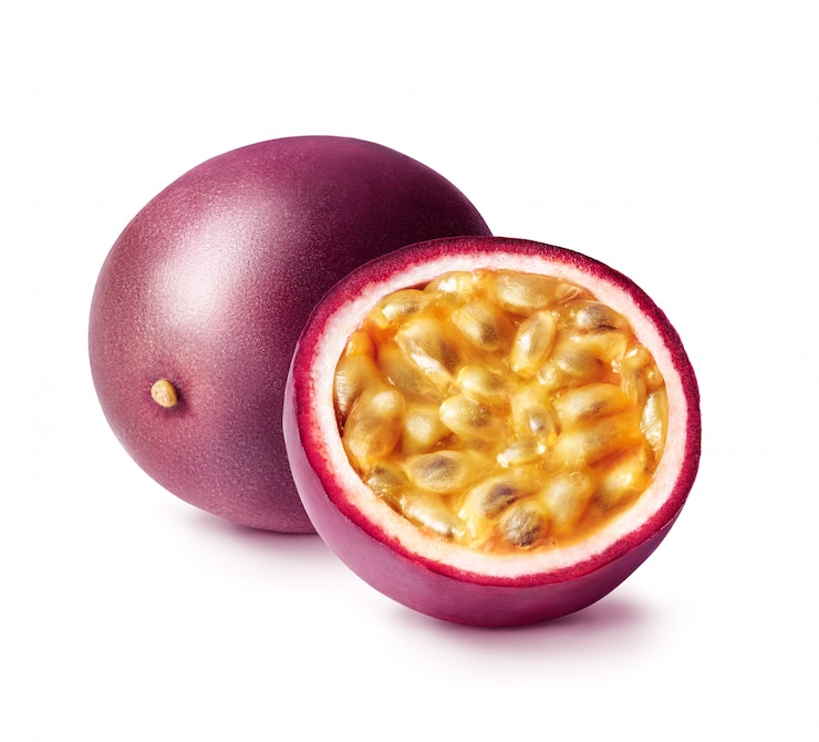 Photo passion fruit isolated. whole passionfruit and a half of maracuya isolated