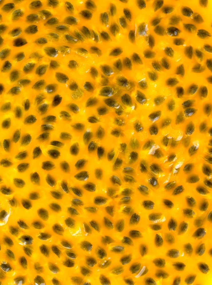 Photo passion fruit juice close up texture for background