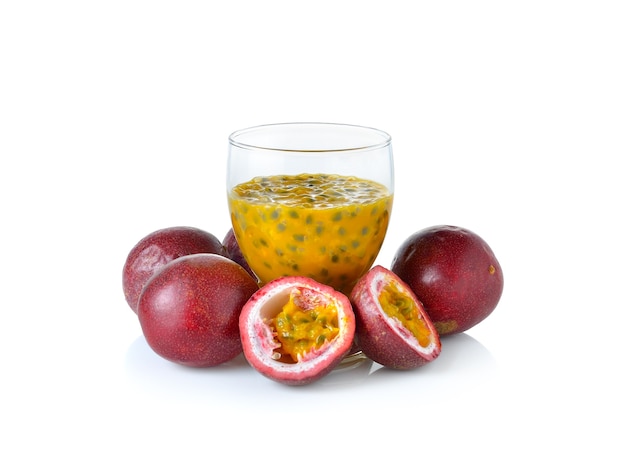 Passion fruit juice on white wall