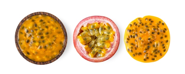 Passion fruit in wood bowl isolated on white surface. top view