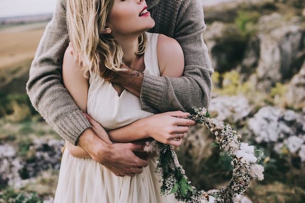 passionate young couple in the mountains