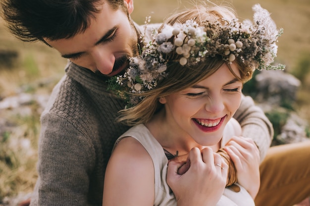 passionate young couple in the mountains