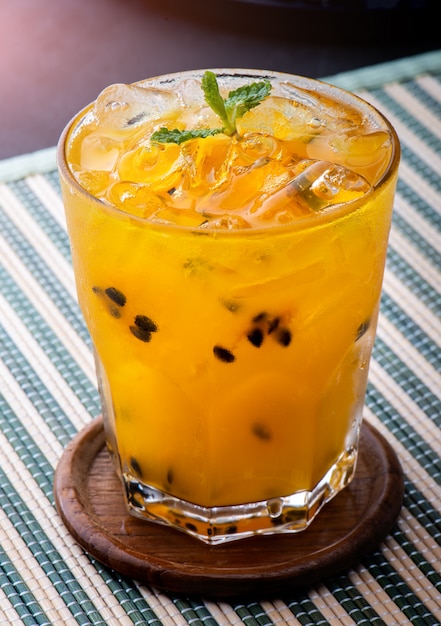 Passionfruit juice with ice .