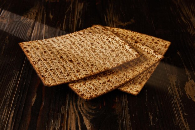 Passover celebration concept Jewish holiday Passover Stack of matzo on a wooden background